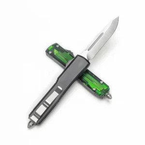 Green translucent handle OTF knife